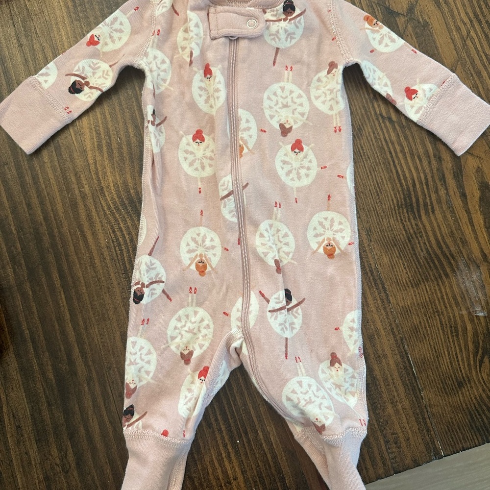 Hanna Anderson pink snowflake dancers onesie.